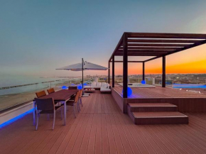 Luxury Seafront Penthouse with Spacious Terrace and Private Parking